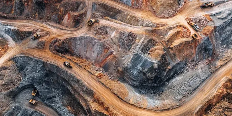 bizzywebai_open_pit_mining_operation_--ar_21_--v_7_d311e763-8715-46f1-afa2-fd6f68369d3b 1